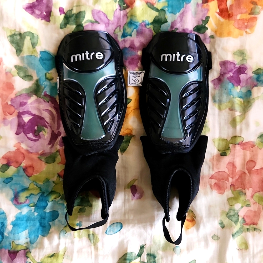 Pair of Mitre Black and green shin and ankle guards. Size PeeWee.